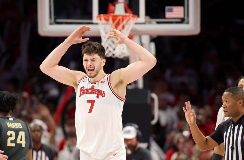 Mar 1, 2026; Columbus, Ohio, USA;  Ohio State Buckeyes center Ivan Njegovan (7) celebrates during the second half against the Purdue Boilermakers at Value City Arena. Mandatory Credit: Joseph Maiorana-Imagn Images