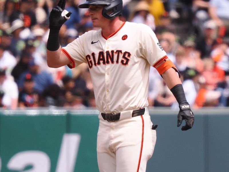 Aug 11, 2024; San Francisco, California, USA; San Francisco Giants shortstop Tyler Fitzgerald (49) reacts after hitting a double against the Detroit Tigers during the first inning at Oracle Park. Mandatory Credit: Kelley L Cox-USA TODAY Sports