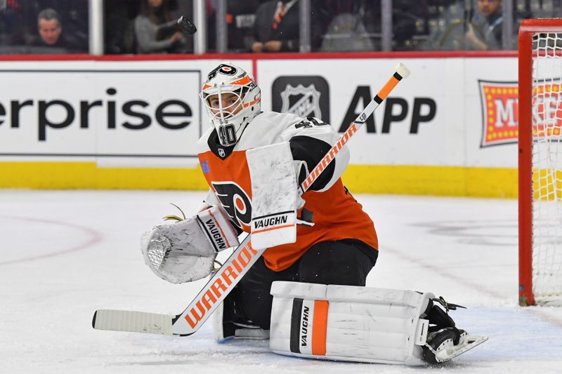 Feb 10, 2024; Philadelphia, Pennsylvania, USA; Philadelphia Flyers goaltender Cal Petersen (40) makes a save against the Seattle Kraken during the second period at Wells Fargo Center. Mandatory Credit: Eric Hartline-USA TODAY Sports