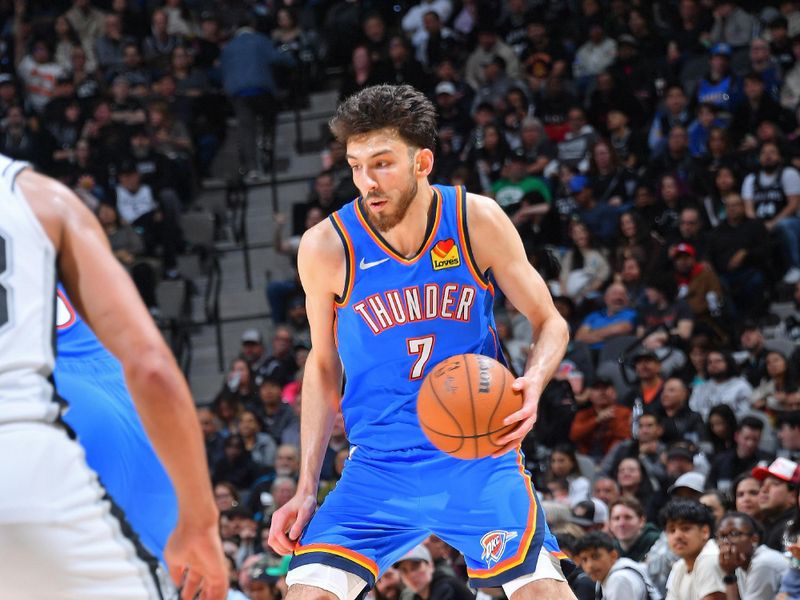 SAN ANTONIO, TX - FEBRUARY 29: Chet Holmgren #7 of the Oklahoma City Thunder dribbles the ball during the game against the San Antonio Spurs on February 29, 2024 at the Frost Bank Center in San Antonio, Texas. NOTE TO USER: User expressly acknowledges and agrees that, by downloading and or using this photograph, user is consenting to the terms and conditions of the Getty Images License Agreement. Mandatory Copyright Notice: Copyright 2024 NBAE (Photos by Michael Gonzales/NBAE via Getty Images)