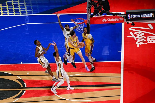 LAS VEGAS, NEVADA - DECEMBER 7: Austin Reaves (15), LeBron James (23) of Los Angeles Lakers and Brandon Ingram (14) of New Orleans Pelicans in action during NBA In-Season Tournament Semifinals game between Los Angeles Lakers and New Orleans Pelicans at the T-Mobile Arena in Las Vegas, Nevada, United States on December 7, 2023. (Photo by Tayfun Coskun/Anadolu via Getty Images)