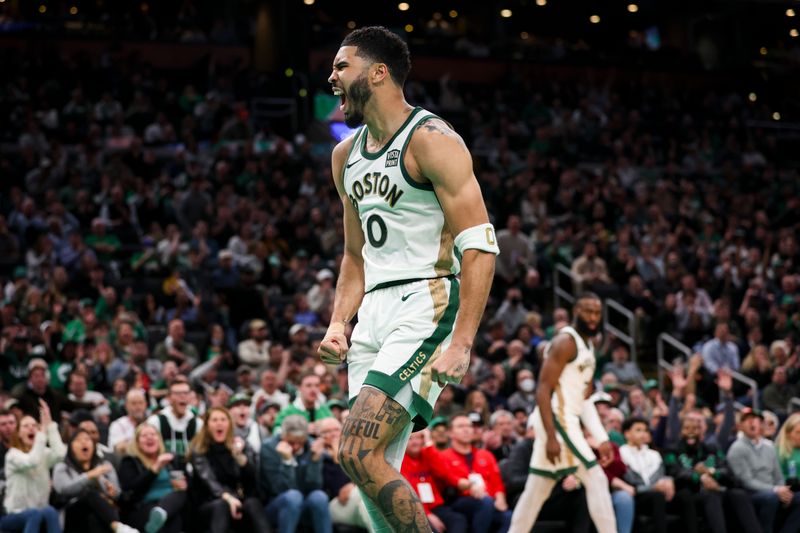 BOSTON, MA - FEBRUARY 27:  Jayson Tatum #0 of the Boston Celtics reacts after a dunk in the fourth quarter during a game against the Philadelphia 76ers at TD Garden on February 27, 2024 in Boston, Massachusetts. NOTE TO USER: User expressly acknowledges and agrees that, by downloading and or using this photograph, User is consenting to the terms and conditions of the Getty Images License Agreement. (Photo by Adam Glanzman/Getty Images)