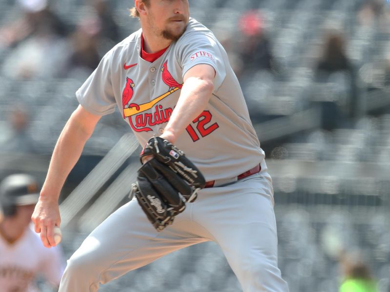 Apr 9, 2025; Pittsburgh, Pennsylvania, USA;  St. Louis Cardinals starting pitcher Erick Fedde (12) delivers a pitch against the Pittsburgh Pirates during the first inning at PNC Park. Mandatory Credit: Charles LeClaire-Imagn Images