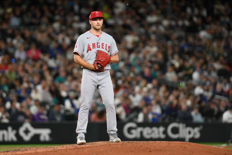 Sep 11, 2023; Seattle, Washington, USA; Los Angeles Angels starting pitcher Reid Detmers (48) looks at first base during the seventh inning against the Seattle Mariners at T-Mobile Park. Mandatory Credit: Steven Bisig-USA TODAY Sports