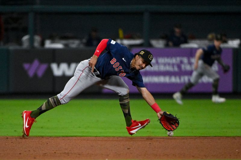 May 17, 2024; St. Louis, Missouri, USA;  Boston Red Sox shortstop David Hamilton (70) is unable to field a ground ball against the St. Louis Cardinals during the sixth inning at Busch Stadium. Mandatory Credit: Jeff Curry-USA TODAY Sports