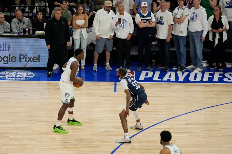 MINNEAPOLIS, MN -  MAY 22: Anthony Edwards #5 of the Minnesota Timberwolves handles the ball during the game  against the Dallas Mavericks during Game 1 of the Western Conference Finals of the 2024 NBA Playoffs on January 1, 2024 at Target Center in Minneapolis, Minnesota. NOTE TO USER: User expressly acknowledges and agrees that, by downloading and or using this Photograph, user is consenting to the terms and conditions of the Getty Images License Agreement. Mandatory Copyright Notice: Copyright 2024 NBAE (Photo by Jordan Johnson/NBAE via Getty Images)