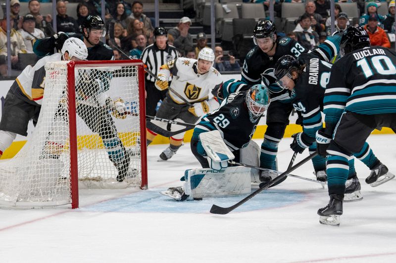 Feb 19, 2024; San Jose, California, USA; San Jose Sharks goalie Mackenzie Blackwood (29) makes a save during the first period against the Vegas Golden Knights at SAP during the first period Center at San Jose. Mandatory Credit: Neville E. Guard-USA TODAY Sports