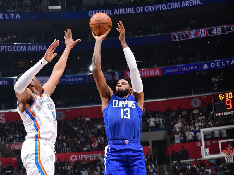 LOS ANGELES, CA - JANUARY 16: Paul George #13 of the LA Clippers shoots the ball during the game against the Oklahoma City Thunder on January 16, 2024 at Crypto.Com Arena in Los Angeles, California. NOTE TO USER: User expressly acknowledges and agrees that, by downloading and/or using this Photograph, user is consenting to the terms and conditions of the Getty Images License Agreement. Mandatory Copyright Notice: Copyright 2024 NBAE (Photo by Adam Pantozzi/NBAE via Getty Images)