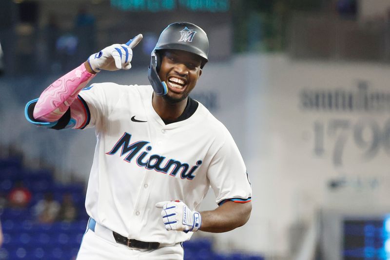 Jun 18, 2024; Miami, Florida, USA; Miami Marlins right fielder Jesus Sanchez (12) reacts after his three run home run against the St. Louis Cardinals in the first inning at loanDepot Park. Mandatory Credit: Rhona Wise-USA TODAY Sports