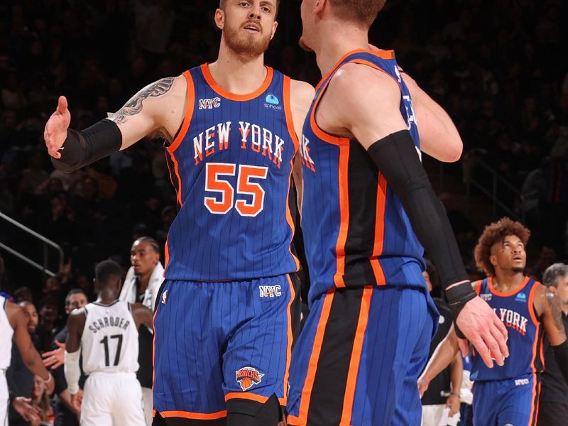 NEW YORK, NY - MARCH 23: Isaiah Hartenstein #55 of the New York Knicks high fives Donte Divincenzo #0 during the game against the Brooklyn Nets on March 23, 2024 at Madison Square Garden in New York City, New York.  NOTE TO USER: User expressly acknowledges and agrees that, by downloading and or using this photograph, User is consenting to the terms and conditions of the Getty Images License Agreement. Mandatory Copyright Notice: Copyright 2024 NBAE  (Photo by Nathaniel S. Butler/NBAE via Getty Images)