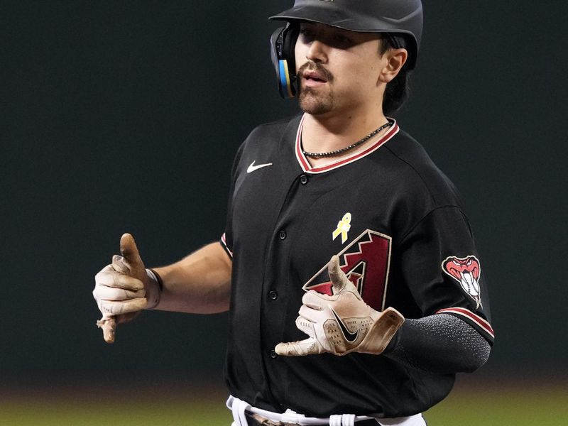 Sep 3, 2023; Phoenix, Arizona, USA; Arizona Diamondbacks right fielder Corbin Carroll (7) runs the bases after hitting a solo home run against the Baltimore Orioles during the third inning at Chase Field. Mandatory Credit: Joe Camporeale-USA TODAY Sports