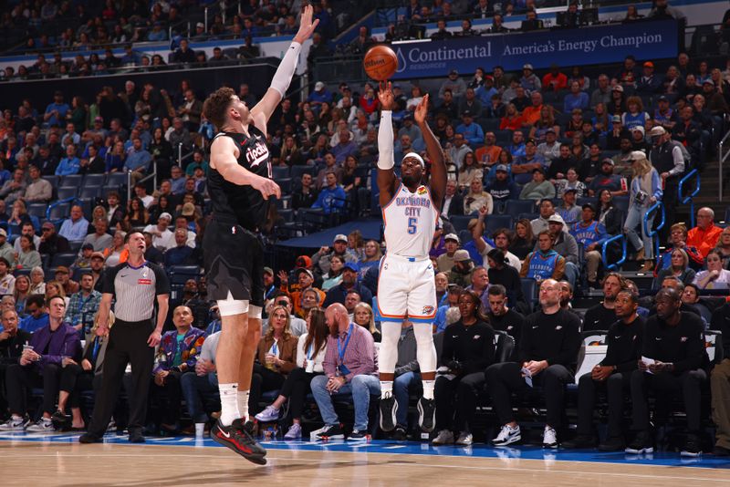 OKLAHOMA CITY, OK - NOVEMBER 20: Luguentz Dort #5 of the Oklahoma City Thunder shoots the ball during the game against the Portland Trail Blazers on November 20, 2024 at Paycom Center in Oklahoma City, Oklahoma. NOTE TO USER: User expressly acknowledges and agrees that, by downloading and or using this photograph, User is consenting to the terms and conditions of the Getty Images License Agreement. Mandatory Copyright Notice: Copyright 2024 NBAE (Photo by Zach Beeker/NBAE via Getty Images)