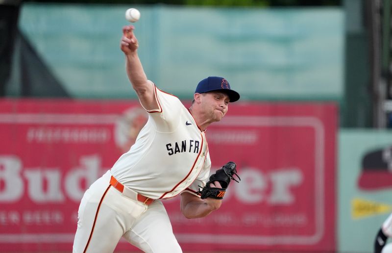 Jun 20, 2024; Fairfield, Alabama, USA; San Francisco Giants pitcher Keaton Winn (67) throws during the 1st inning against the St. Louis Cardinals in the MLB at Rickwood Field tribute game to the Negro Leagues. Rickwood Field is the oldest baseball stadium in America. Mandatory Credit: John David Mercer-USA TODAY Sports