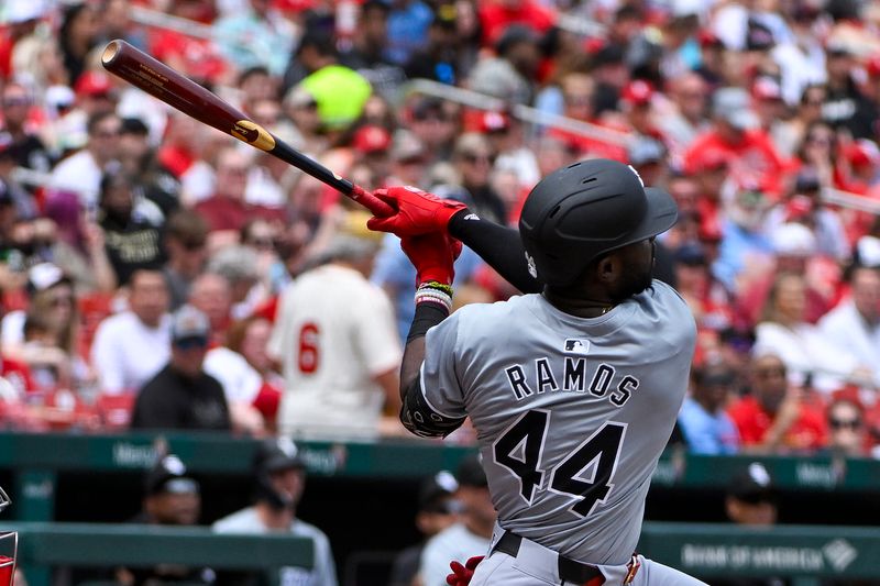 May 5, 2024; St. Louis, Missouri, USA;  Chicago White Sox third baseman Bryan Ramos (44) hits a one run sacrifice fly against the St. Louis Cardinals during the second inning at Busch Stadium. Mandatory Credit: Jeff Curry-USA TODAY Sports