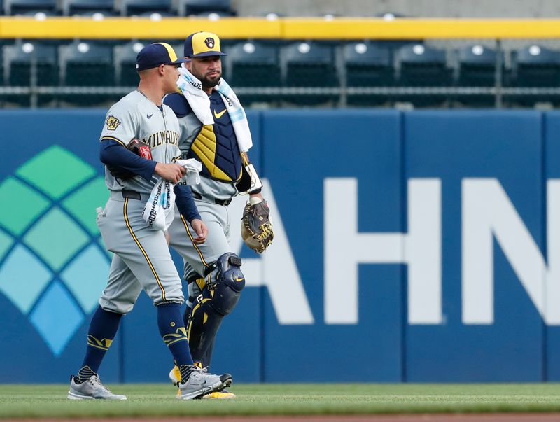 Apr 23, 2024; Pittsburgh, Pennsylvania, USA;  Milwaukee Brewers starting pitcher Tobias Myers (36) walks in from the bullpen with catcher Gary Sanchez (99) for his major league debut against the Pittsburgh Pirates at PNC Park. Mandatory Credit: Charles LeClaire-USA TODAY Sports