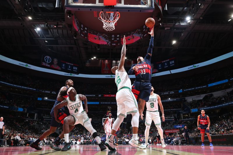 WASHINGTON, DC -? NOVEMBER 22: Kyle Kuzma #33 of the Washington Wizards drives to the basket during the game against the Boston Celtics during the Emirates NBA Cup game on November 22, 2024 at Capital One Arena in Washington, DC. NOTE TO USER: User expressly acknowledges and agrees that, by downloading and or using this Photograph, user is consenting to the terms and conditions of the Getty Images License Agreement. Mandatory Copyright Notice: Copyright 2024 NBAE (Photo by Stephen Gosling/NBAE via Getty Images)