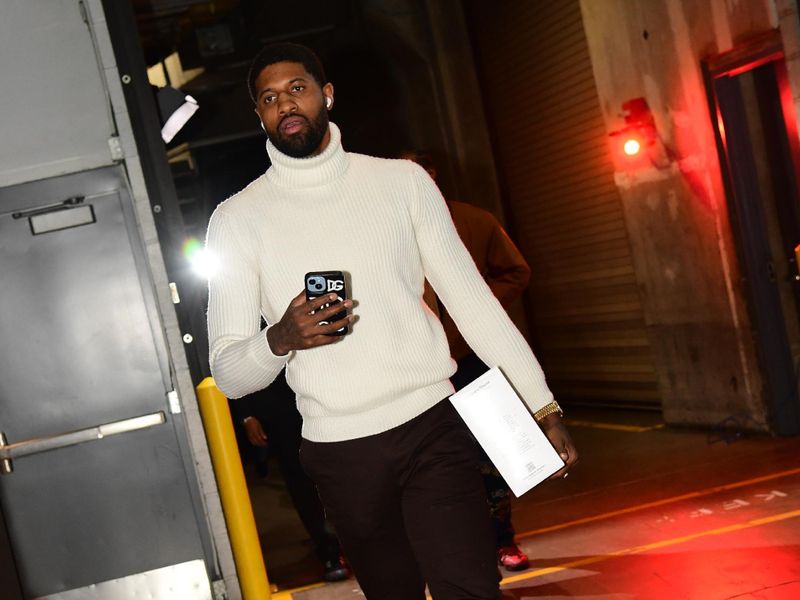 LOS ANGELES, CA - JANUARY 17: Paul George #13 of the LA Clippers arrives to the arena before the game Philadelphia 76ers on January 17, 2023 at Crypto.Com Arena in Los Angeles, California. NOTE TO USER: User expressly acknowledges and agrees that, by downloading and/or using this Photograph, user is consenting to the terms and conditions of the Getty Images License Agreement. Mandatory Copyright Notice: Copyright 2023 NBAE (Photo by Adam Pantozzi/NBAE via Getty Images)