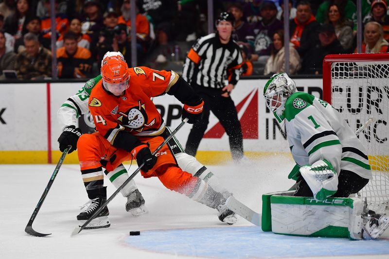 Jan 13, 2026; Anaheim, California, USA; Anaheim Ducks defenseman Ian Moore (74) moves in for a shot against Dallas Stars goaltender Casey DeSmith (1) ahead of Dallas Stars defenseman Esa Lindell (23) during the second period at Honda Center. Mandatory Credit: Gary A. Vasquez-Imagn Images