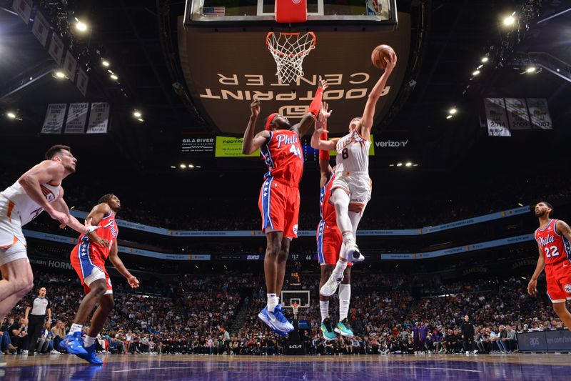 PHOENIX, AZ - MARCH 20:  Grayson Allen #8 of the Phoenix Suns drives to the basket during the game against the Philadelphia 76ers on March 20, 2024 at Footprint Center in Phoenix, Arizona. NOTE TO USER: User expressly acknowledges and agrees that, by downloading and or using this photograph, user is consenting to the terms and conditions of the Getty Images License Agreement. Mandatory Copyright Notice: Copyright 2024 NBAE (Photo by Barry Gossage/NBAE via Getty Images)