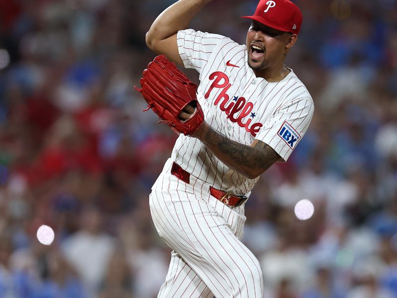 Aug 3, 2025; Philadelphia, Pennsylvania, USA; Philadelphia Phillies pitcher Jhoan Duran (59) reacts after a strike out to end the ninth inning of a win against the Detroit Tigers at Citizens Bank Park. Mandatory Credit: Bill Streicher-Imagn Images
