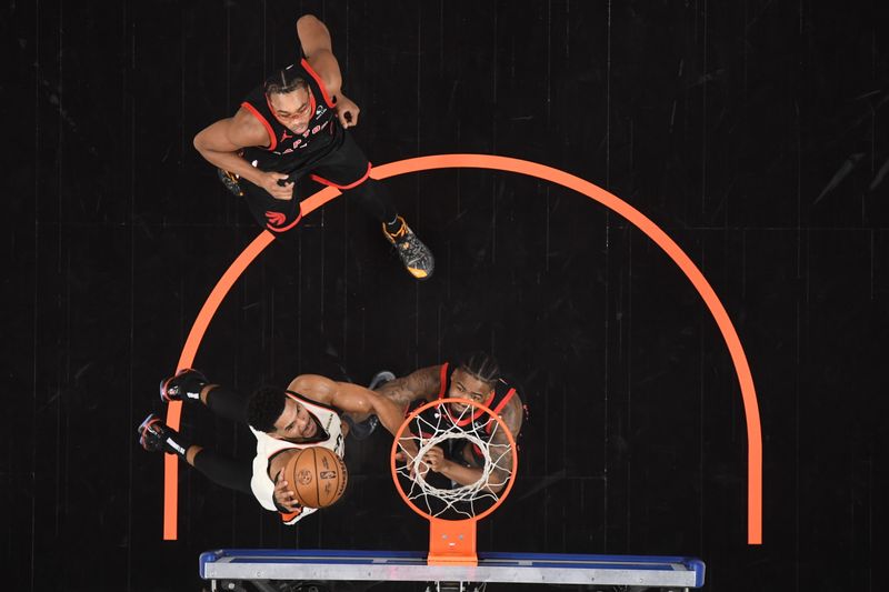 DETROIT, MI - NOVEMBER 24: Tobias Harris #12 of the Detroit Pistons drives to the basket during the game against the Toronto Raptors on November 24, 2024 at Little Caesars Arena in Detroit, Michigan. NOTE TO USER: User expressly acknowledges and agrees that, by downloading and/or using this photograph, User is consenting to the terms and conditions of the Getty Images License Agreement. Mandatory Copyright Notice: Copyright 2024 NBAE (Photo by Chris Schwegler/NBAE via Getty Images)