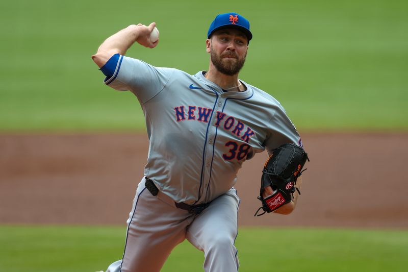 Sep 30, 2024; Atlanta, Georgia, USA; New York Mets starting pitcher Tylor Megill (38) throws against the Atlanta Braves in the first inning at Truist Park. Mandatory Credit: Brett Davis-Imagn Images
