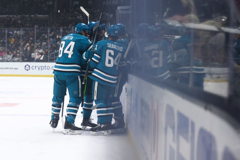 Dec 27, 2023; Los Angeles, California, USA; The San Jose Sharks celebrate a goal by San Jose Sharks left wing Fabian Zetterlund (20) against the Los Angeles Kings during the first period of a game at Crypto.com Arena. Mandatory Credit: Jessica Alcheh-USA TODAY Sports