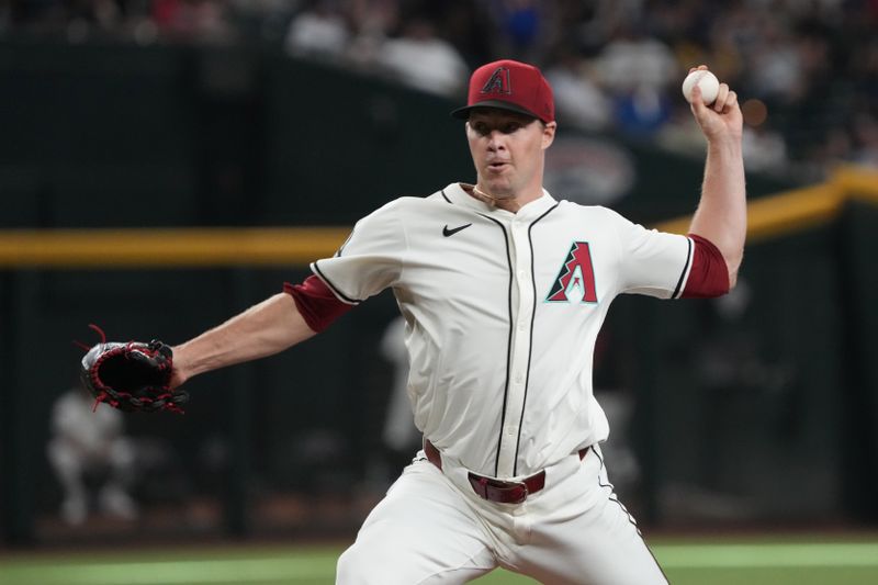 Aug 11, 2024; Phoenix, Arizona, USA; Arizona Diamondbacks pitcher Joe Mantiply (35) throws against the Philadelphia Phillies in the sixth inning at Chase Field. Mandatory Credit: Rick Scuteri-USA TODAY Sports