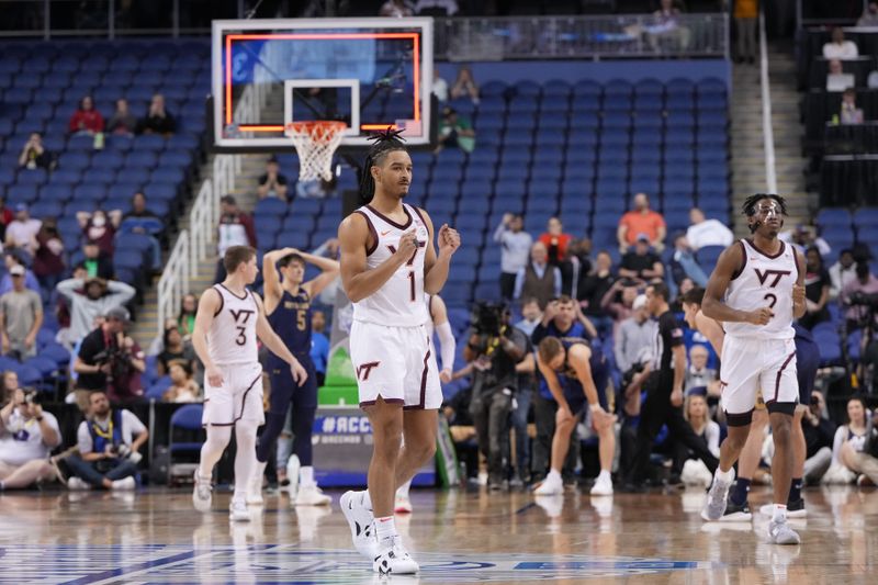 Mar 7, 2023; Greensboro, NC, USA; Virginia Tech Hokies guard Rodney Rice (1) reacts after winning the game at Greensboro Coliseum. Mandatory Credit: Bob Donnan-USA TODAY Sports