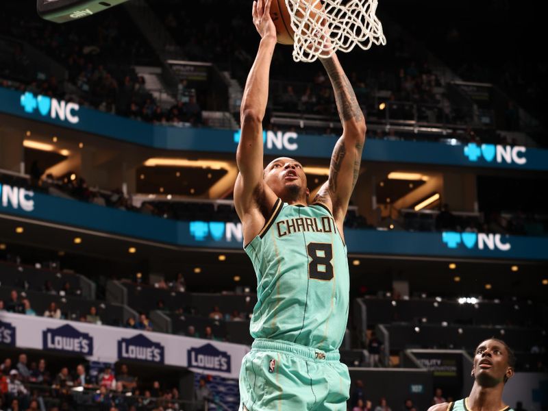 CHARLOTTE, NC - JANUARY 31:  Nick Smith Jr. #8 of the Charlotte Hornets dunks the ball during the game against the LA Clippers on January 31, 2025 at Spectrum Center in Charlotte, North Carolina. NOTE TO USER: User expressly acknowledges and agrees that, by downloading and or using this photograph, User is consenting to the terms and conditions of the Getty Images License Agreement. Mandatory Copyright Notice: Copyright 2025 NBAE (Photo by Kent Smith/NBAE via Getty Images)