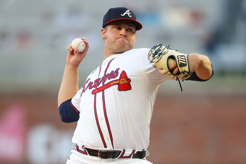 Apr 22, 2024; Atlanta, Georgia, USA; Atlanta Braves starting pitcher Bryce Elder (55) throws against the Miami Marlins in the first inning at Truist Park. Mandatory Credit: Brett Davis-USA TODAY Sports