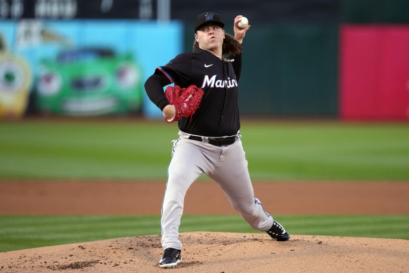 May 3, 2024; Oakland, California, USA; Miami Marlins starting pitcher Ryan Weathers (60) throws a pitch against the Oakland Athletics during the first inning at Oakland-Alameda County Coliseum. Mandatory Credit: Darren Yamashita-USA TODAY Sports