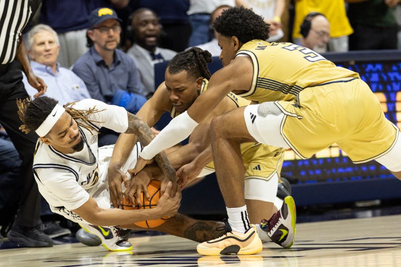 Feb 4, 2026; Berkeley, California, USA; California Golden Bears forward Chris Bell (22) and Georgia Tech Yellow Jackets guards Lamar Washington (1) and Jaeden Mustaf (3) chase a loose ball during the second half at Haas Pavilion. Mandatory Credit: D. Ross Cameron-Imagn Images