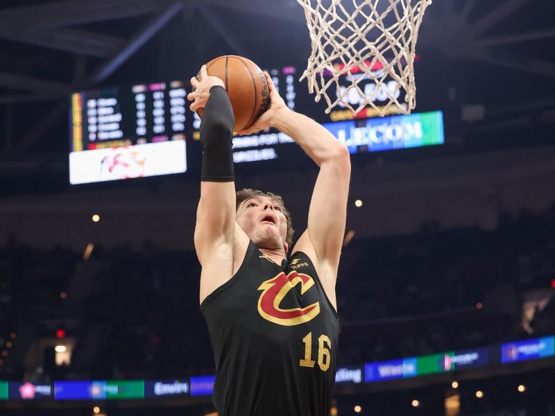 CLEVELAND, OH - FEBUARY 2:  Cedi Osman #16 of the Cleveland Cavaliers drives to the basket during the game on Febuary 2, 2023 at Rocket Mortgage FieldHouse in Cleveland, Ohio. NOTE TO USER: User expressly acknowledges and agrees that, by downloading and/or using this Photograph, user is consenting to the terms and conditions of the Getty Images License Agreement. Mandatory Copyright Notice: Copyright 2023 NBAE (Photo by  Lauren Bacho/NBAE via Getty Images)