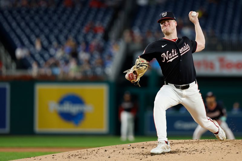 Sep 25, 2024; Washington, District of Columbia, USA; Washington Nationals starting pitcher DJ Herz (74) pitches against the Kansas City Royals during the second inning at Nationals Park. Mandatory Credit: Geoff Burke-Imagn Images