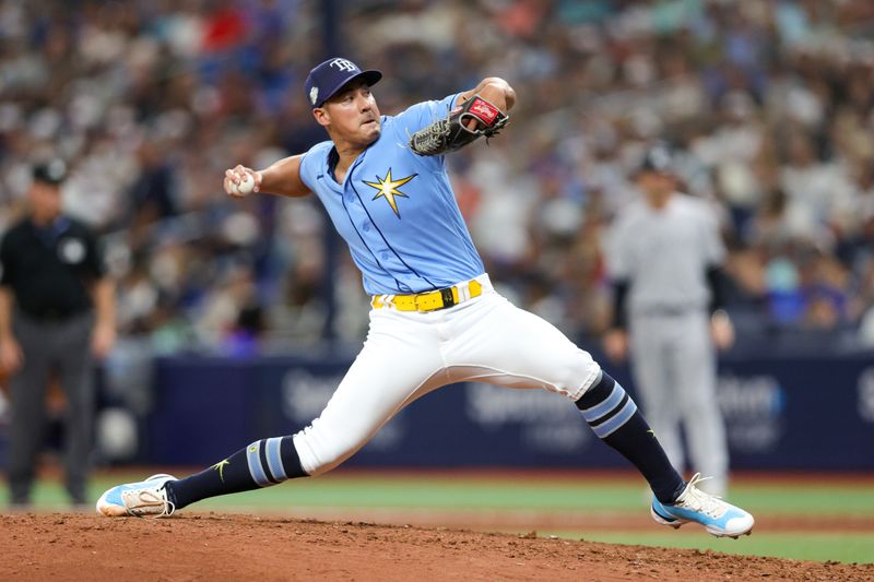 Aug 27, 2023; St. Petersburg, Florida, USA;  Tampa Bay Rays relief pitcher Robert Stephenson (26) throws a pitch  against the New York Yankees in the eighth inning at Tropicana Field. Mandatory Credit: Nathan Ray Seebeck-USA TODAY Sports