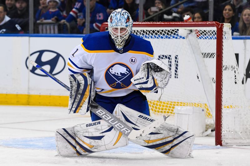 Dec 23, 2023; New York, New York, USA; Buffalo Sabres goaltender Ukko-Pekka Luukkonen (1) makes a save against the New York Rangers during the third period at Madison Square Garden. Mandatory Credit: Dennis Schneidler-USA TODAY Sports