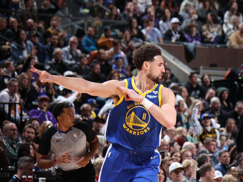 SALT LAKE CITY, UT - FEBRUARY 15: Klay Thompson #11 of the Golden State Warriors celebrates a three point basket during the game against the Utah Jazz on February 15, 2024 at Delta Center in Salt Lake City, Utah. NOTE TO USER: User expressly acknowledges and agrees that, by downloading and or using this Photograph, User is consenting to the terms and conditions of the Getty Images License Agreement. Mandatory Copyright Notice: Copyright 2024 NBAE (Photo by Melissa Majchrzak/NBAE via Getty Images)