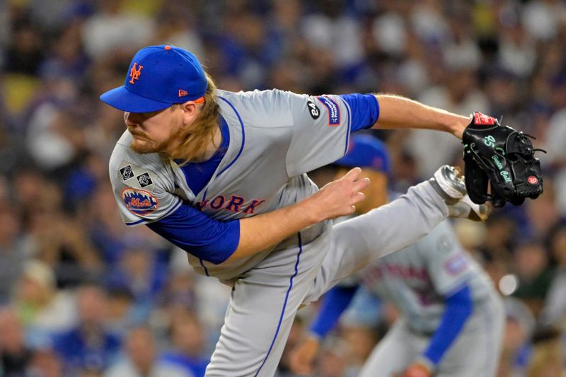 Oct 20, 2024; Los Angeles, California, USA; New York Mets pitcher Ryne Stanek (55) pitches in the sixth inning against the Los Angeles Dodgers during game six of the NLCS for the 2024 MLB playoffs at Dodger Stadium. Mandatory Credit: Jayne Kamin-Oncea-Imagn Images