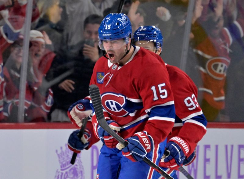 Nov 8, 2025; Montreal, Quebec, CAN; Montreal Canadiens forward Alex Newhook (15) celebrates after scoring a goal against the Utah Mammoth during the second period at the Bell Centre. Mandatory Credit: Eric Bolte-Imagn Images