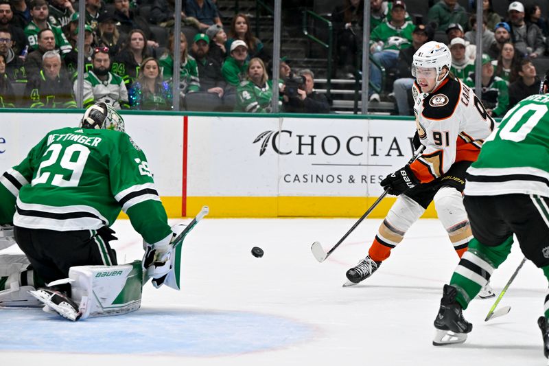 Jan 25, 2024; Dallas, Texas, USA; Dallas Stars goaltender Jake Oettinger (29) stops a shot by Anaheim Ducks center Leo Carlsson (91) during the third period at the American Airlines Center. Mandatory Credit: Jerome Miron-USA TODAY Sports