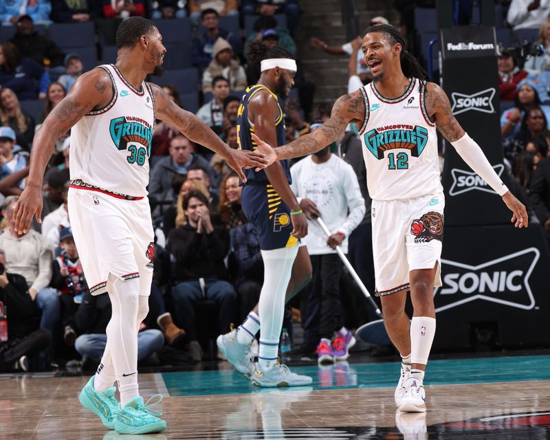 MEMPHIS, TN - DECEMBER 1: Ja Morant #12 and Marcus Smart #36 of the Memphis Grizzlies high five during the game against the Indiana Pacers on December 1, 2024 at FedExForum in Memphis, Tennessee. NOTE TO USER: User expressly acknowledges and agrees that, by downloading and or using this photograph, User is consenting to the terms and conditions of the Getty Images License Agreement. Mandatory Copyright Notice: Copyright 2024 NBAE (Photo by Joe Murphy/NBAE via Getty Images)