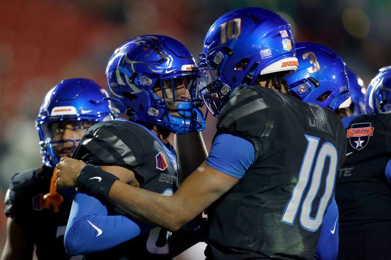 Dec 17, 2022; Frisco, Texas, USA;  Boise State Broncos wide receiver Eric McAlister (80) and quarterback Jace Ruder (10) celebrate after a touchdown against the North Texas Mean Green in the second half at Toyota Stadium. Mandatory Credit: Tim Heitman-USA TODAY Sports