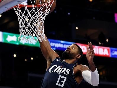 LOS ANGELES, CALIFORNIA - NOVEMBER 24: Paul George #13 of the Los Angeles Clippers dunks the ball against the New Orleans Pelicans in the fourth quarter during an NBA In-Season Tournament game at Crypto.com Arena on November 24, 2023 in Los Angeles, California. NOTE TO USER: User expressly acknowledges and agrees that, by downloading and or using this photograph, User is consenting to the terms and conditions of the Getty Images License Agreement.  (Photo by Katelyn Mulcahy/Getty Images)