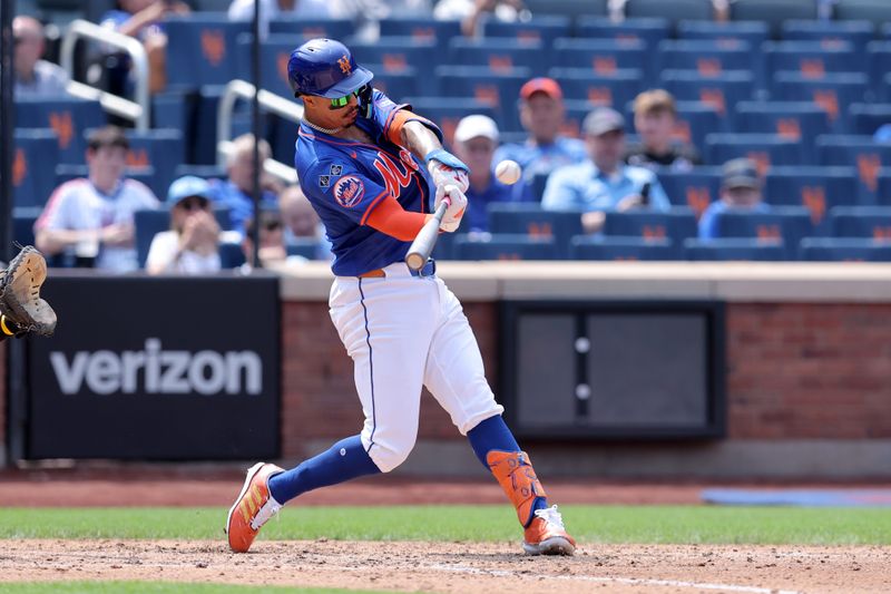 Aug 15, 2024; New York City, New York, USA; New York Mets third baseman Mark Vientos (27) hits a two run home run against the Oakland Athletics during the third inning at Citi Field. Mandatory Credit: Brad Penner-USA TODAY Sports