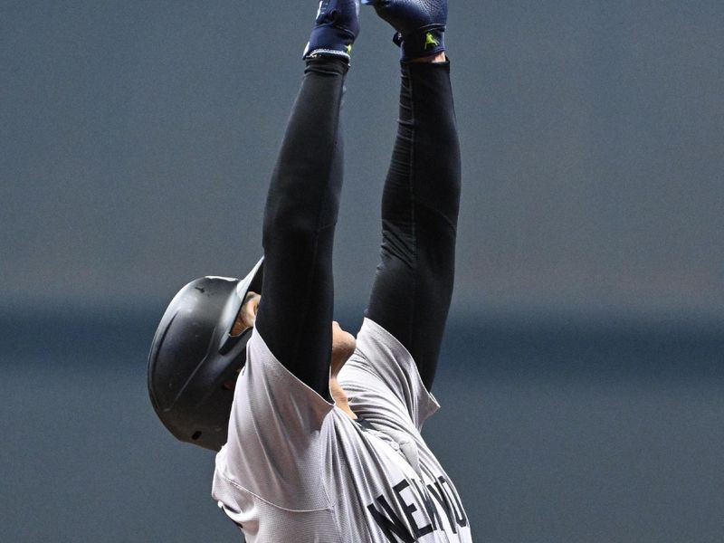 Apr 26, 2024; Milwaukee, Wisconsin, USA;  New York Yankees outfielder Juan Soto (22) celebrates hitting a home run against the Milwaukee Brewers in the first inning at American Family Field. Mandatory Credit: Michael McLoone-USA TODAY Sports