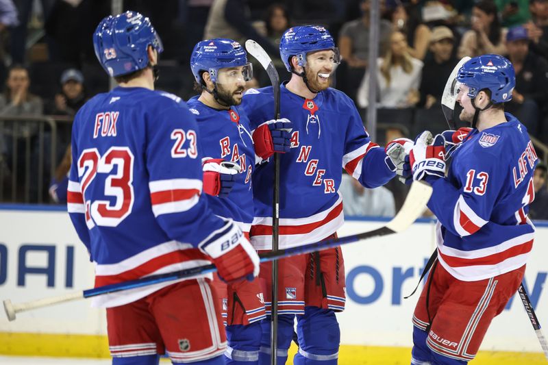 Mar 18, 2026; New York, New York, USA;  New York Rangers defenseman Vladislav Gavrikov (44) celebrates with his teammates after scoring a goal in the first period against the New Jersey Devils at Madison Square Garden. Mandatory Credit: Wendell Cruz-Imagn Images