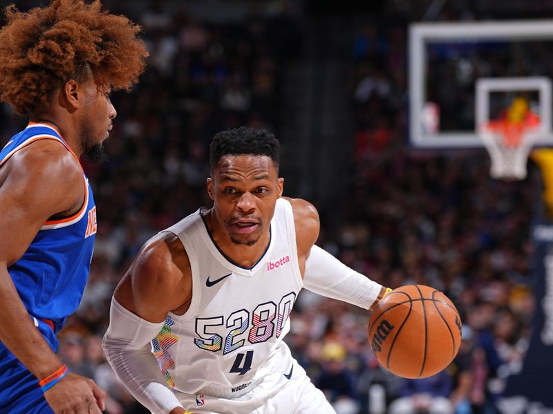 DENVER, CO - NOVEMBER 25: Russell Westbrook #4 of the Denver Nuggets dribbles the ball during the game against the New York Knicks on November 25, 2024 at Ball Arena in Denver, Colorado. NOTE TO USER: User expressly acknowledges and agrees that, by downloading and/or using this Photograph, user is consenting to the terms and conditions of the Getty Images License Agreement. Mandatory Copyright Notice: Copyright 2024 NBAE (Photo by Garrett Ellwood/NBAE via Getty Images)