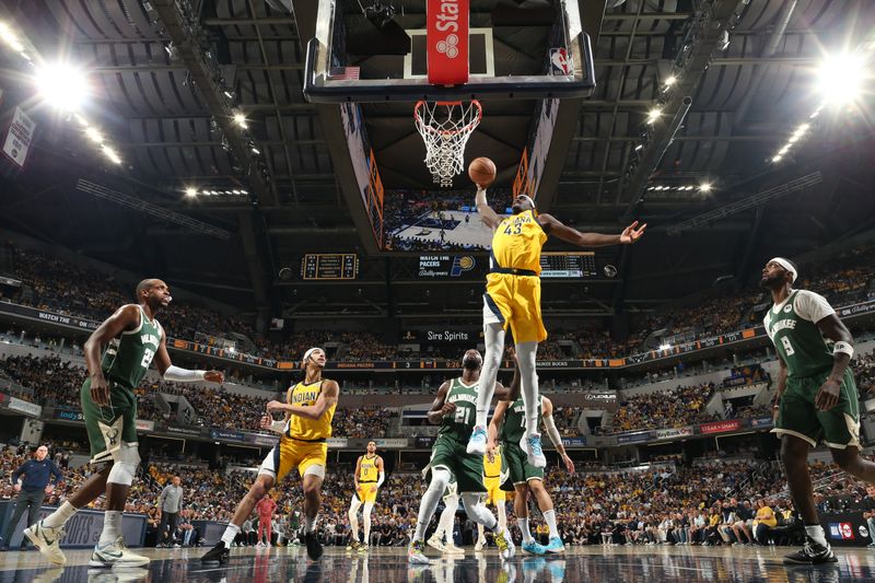 INDIANAPOLIS, IN - APRIL 28: Pascal Siakam #43 of the Indiana Pacers drives to the basket during the game against the Milwaukee Bucks during Round 1 Game 4 of the 2024 NBA Playoffs on April 28, 2024 at Gainbridge Fieldhouse in Indianapolis, Indiana. NOTE TO USER: User expressly acknowledges and agrees that, by downloading and or using this Photograph, user is consenting to the terms and conditions of the Getty Images License Agreement. Mandatory Copyright Notice: Copyright 2024 NBAE (Photo by Nathaniel S. Butler/NBAE via Getty Images)