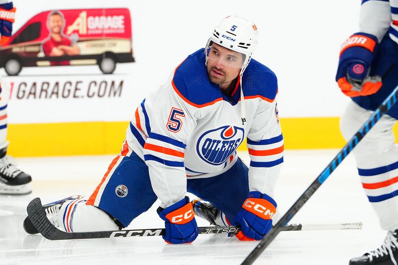 Feb 6, 2024; Las Vegas, Nevada, USA; Edmonton Oilers defenseman Cody Ceci (5) warms up before a game against the Vegas Golden Knights at T-Mobile Arena. Mandatory Credit: Stephen R. Sylvanie-USA TODAY Sports